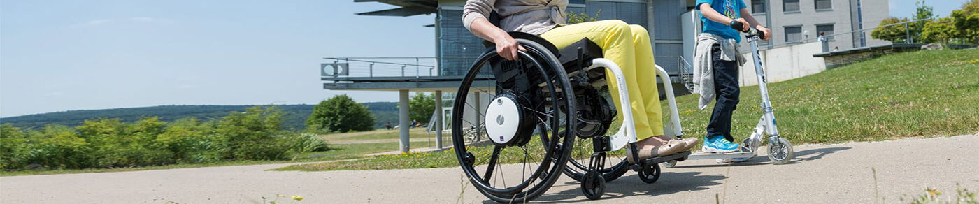 Layoutbild Seitenkopf - Aktivrollstuhl mit E-Anrieb